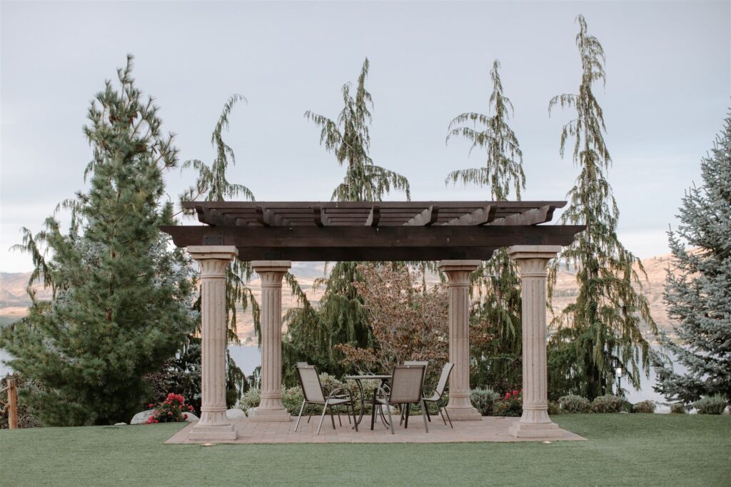 The pergola and lawn above the lake